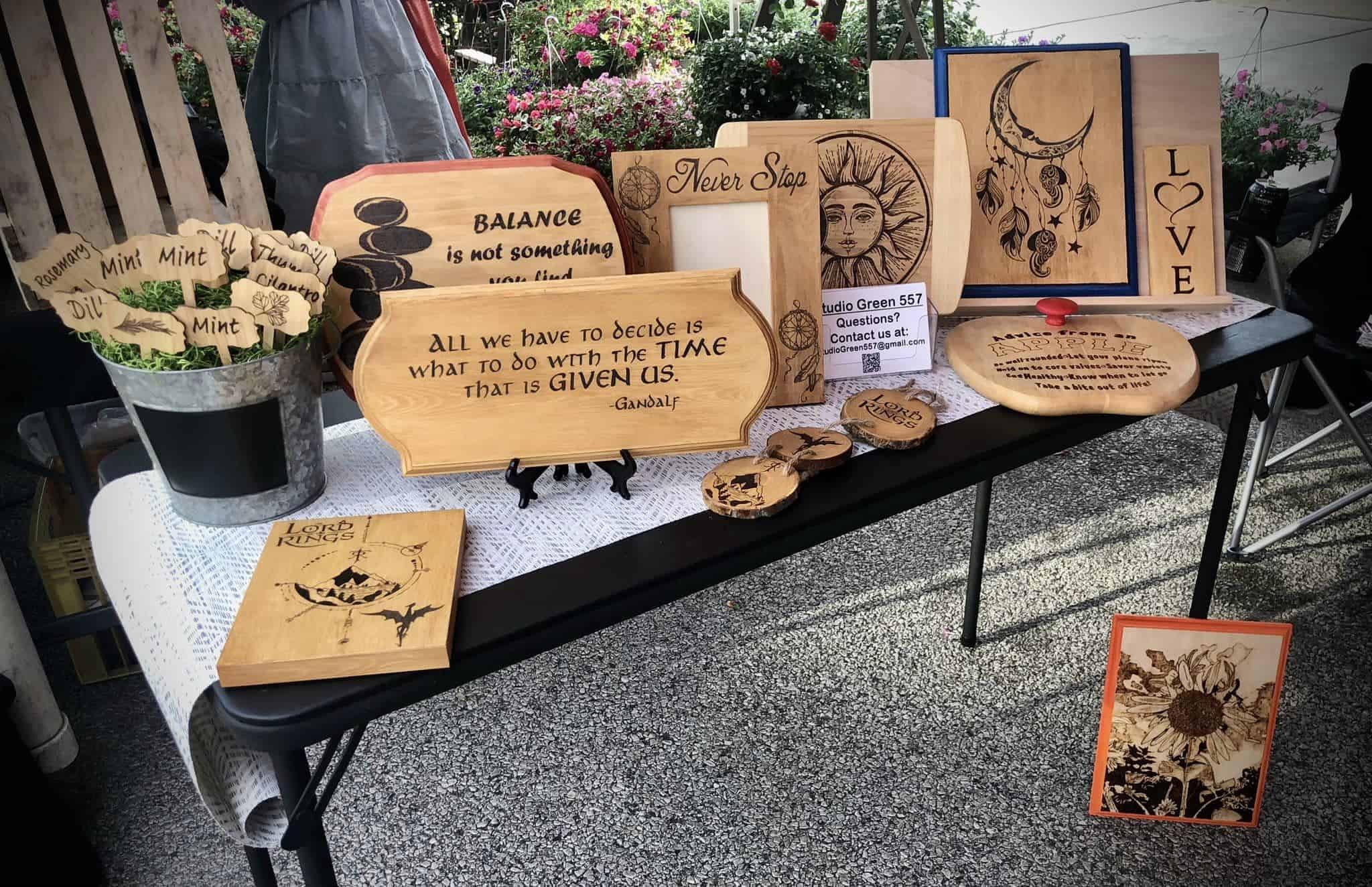 Word burning signs on a table